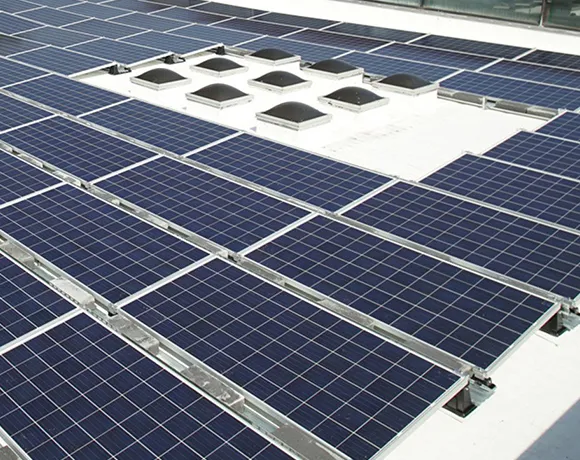 Close-up view of blue solar panels capturing sunlight for energy generation.